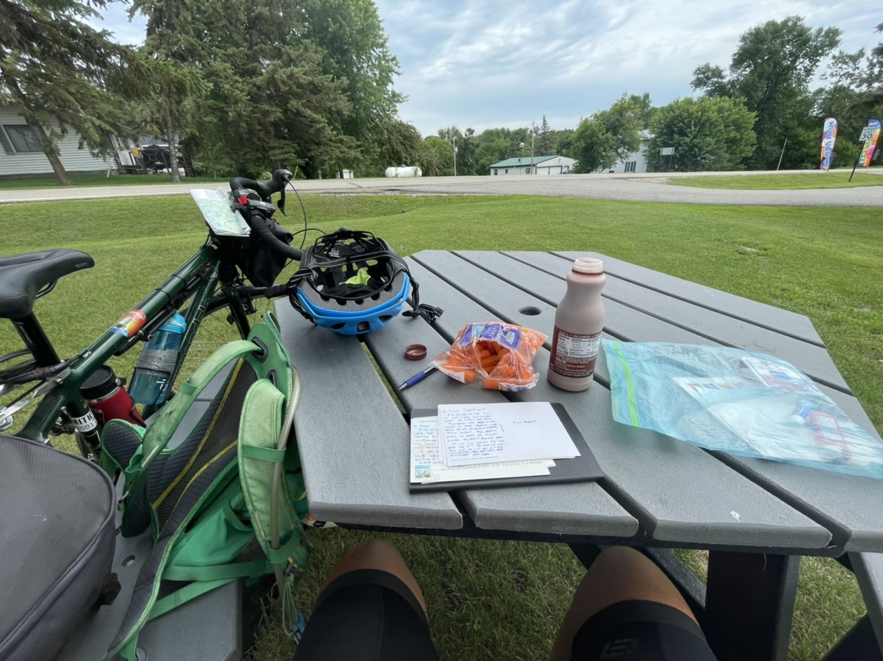 Chocolate milk, baby carrots, and post card writing