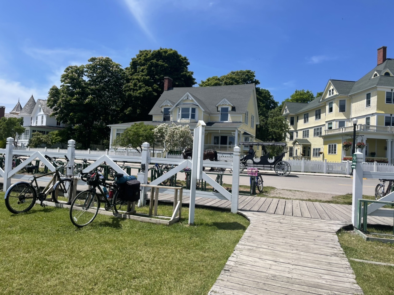 Lots of bike parking and horse drawn carriages on Mackinac Island