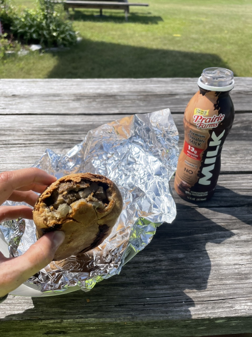 First lunch of a beef, potato, carrot, and rutabaga pasty and a chocolate milk 