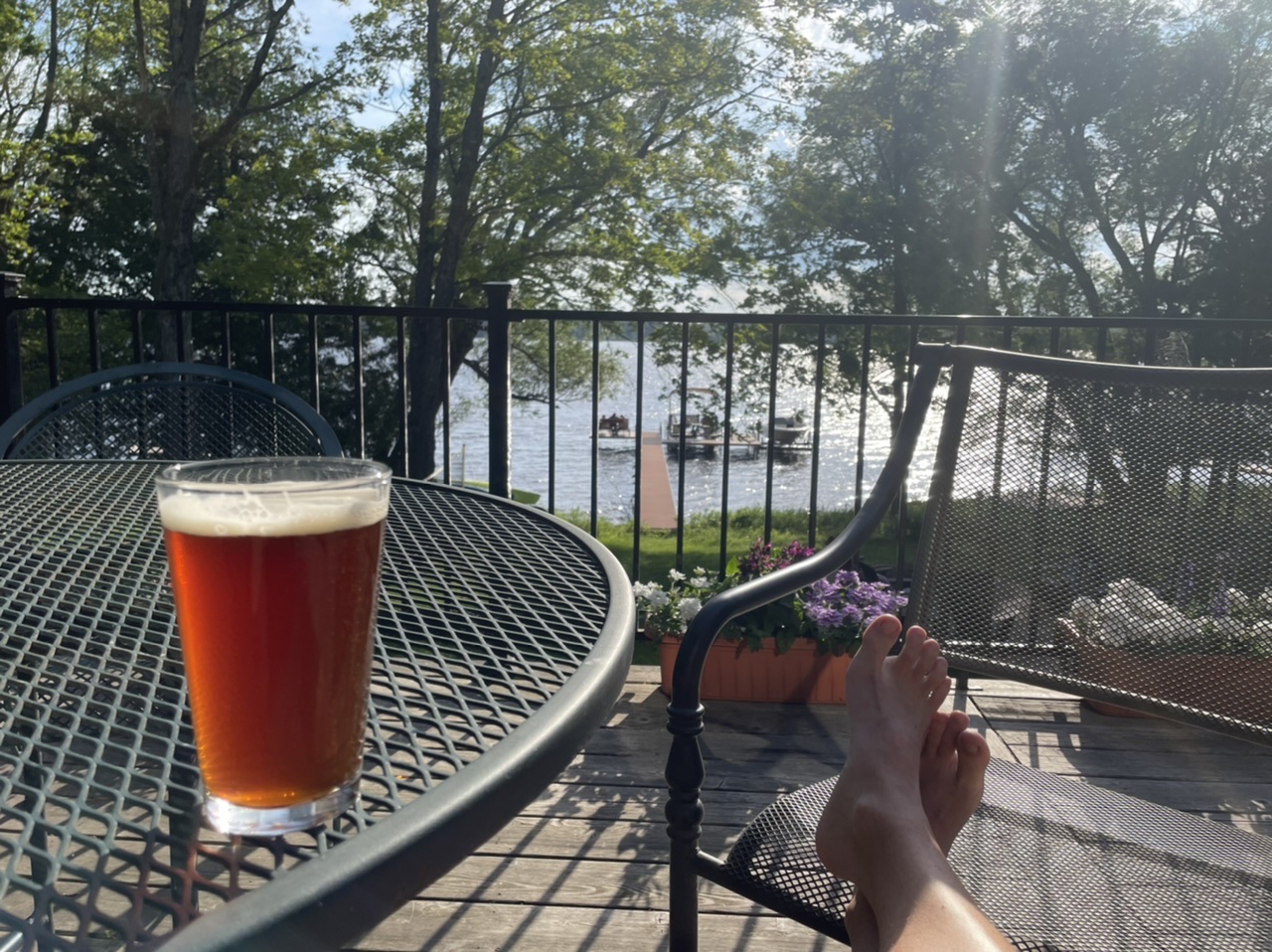 Relaxing on Dan and Jeanne’s deck overlooking the lake while sipping a home brewed beer