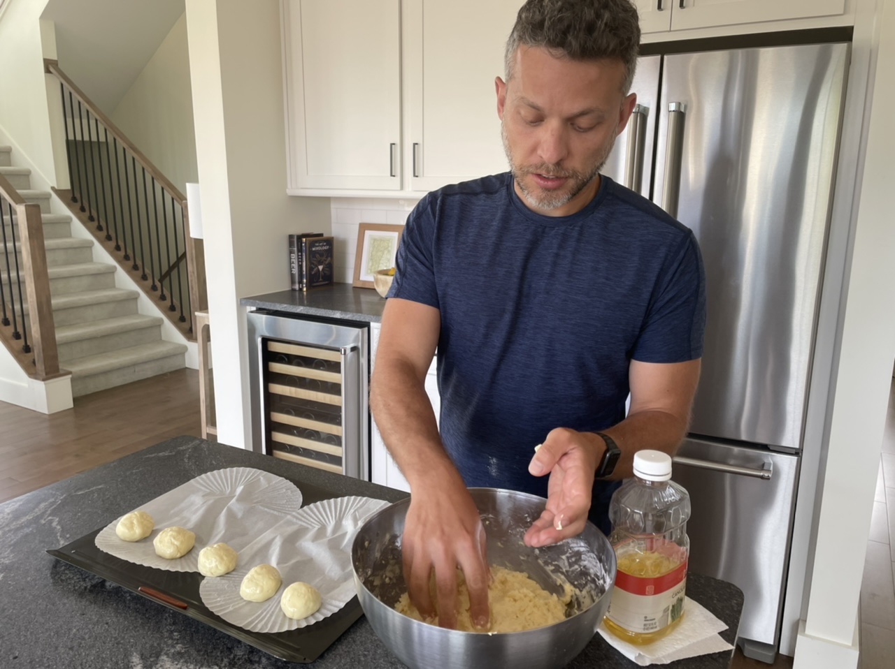 Fernando making pao de queijo for breakfast