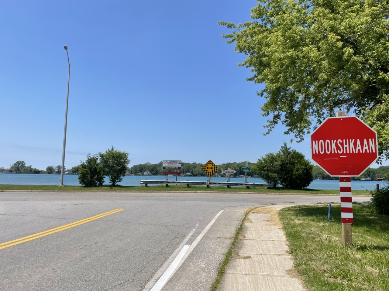 The end of Canada. The stop sign is in the language of the local first nation