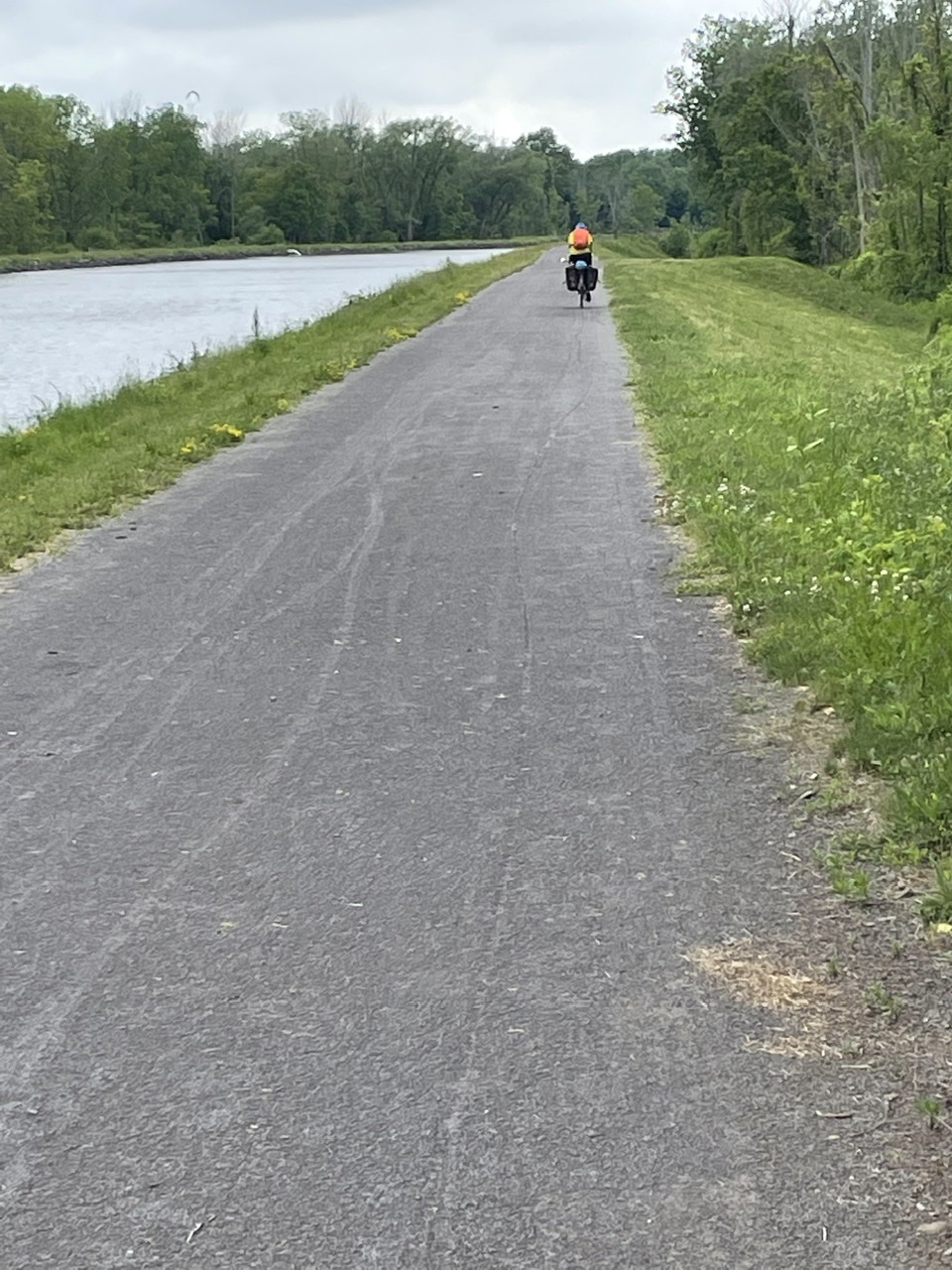 Biking along the Erie Canal. You can see all the tire tracks as the crushed limestone is soft from the rain