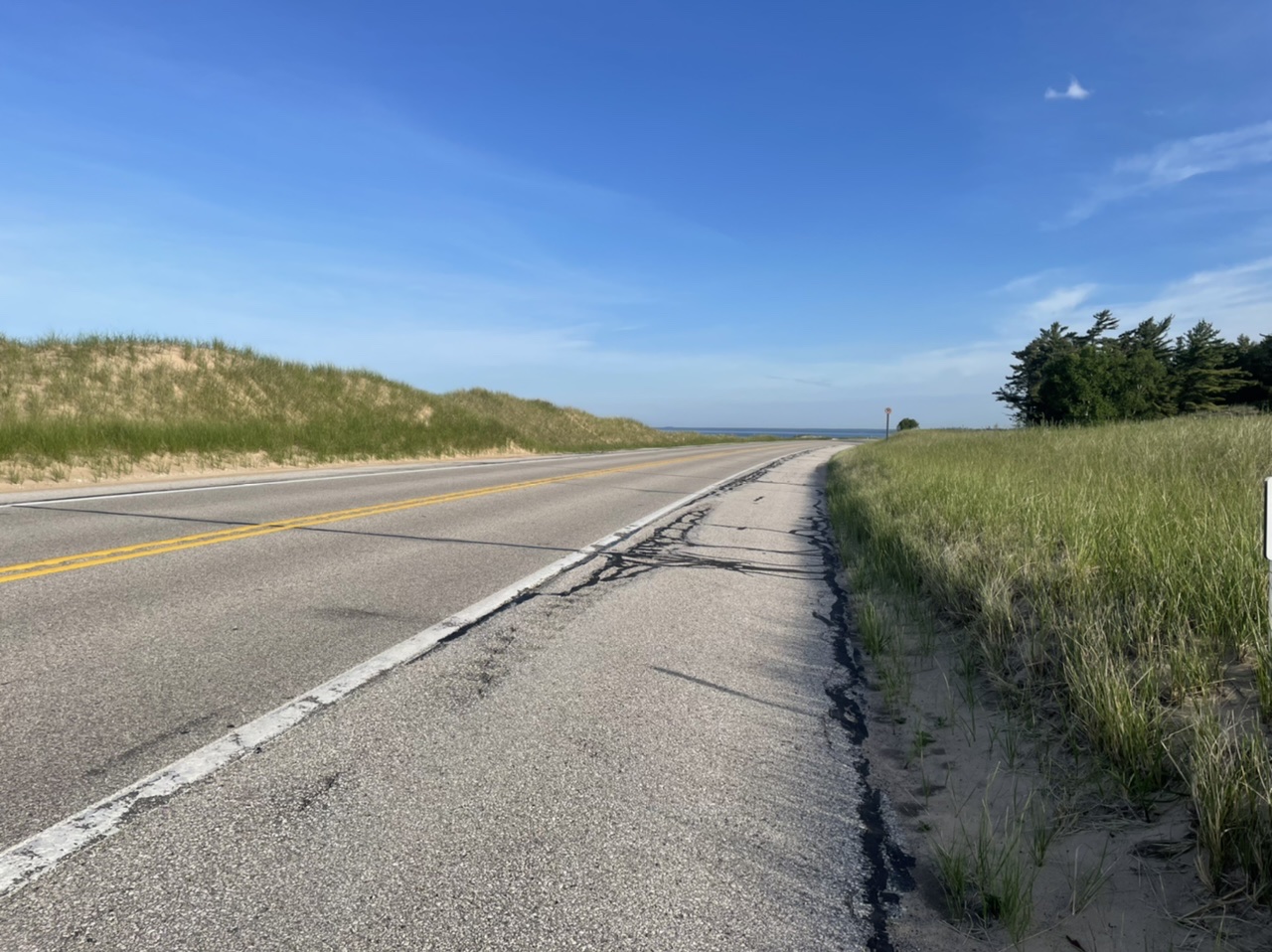 Biking along route 2 among the dunes of Lake Michigan