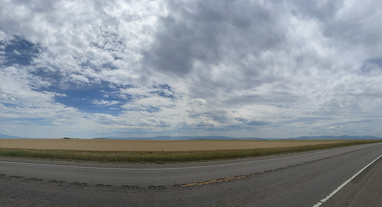 Wheat fields, mountains in the distance, and clouds were the main scenery today 