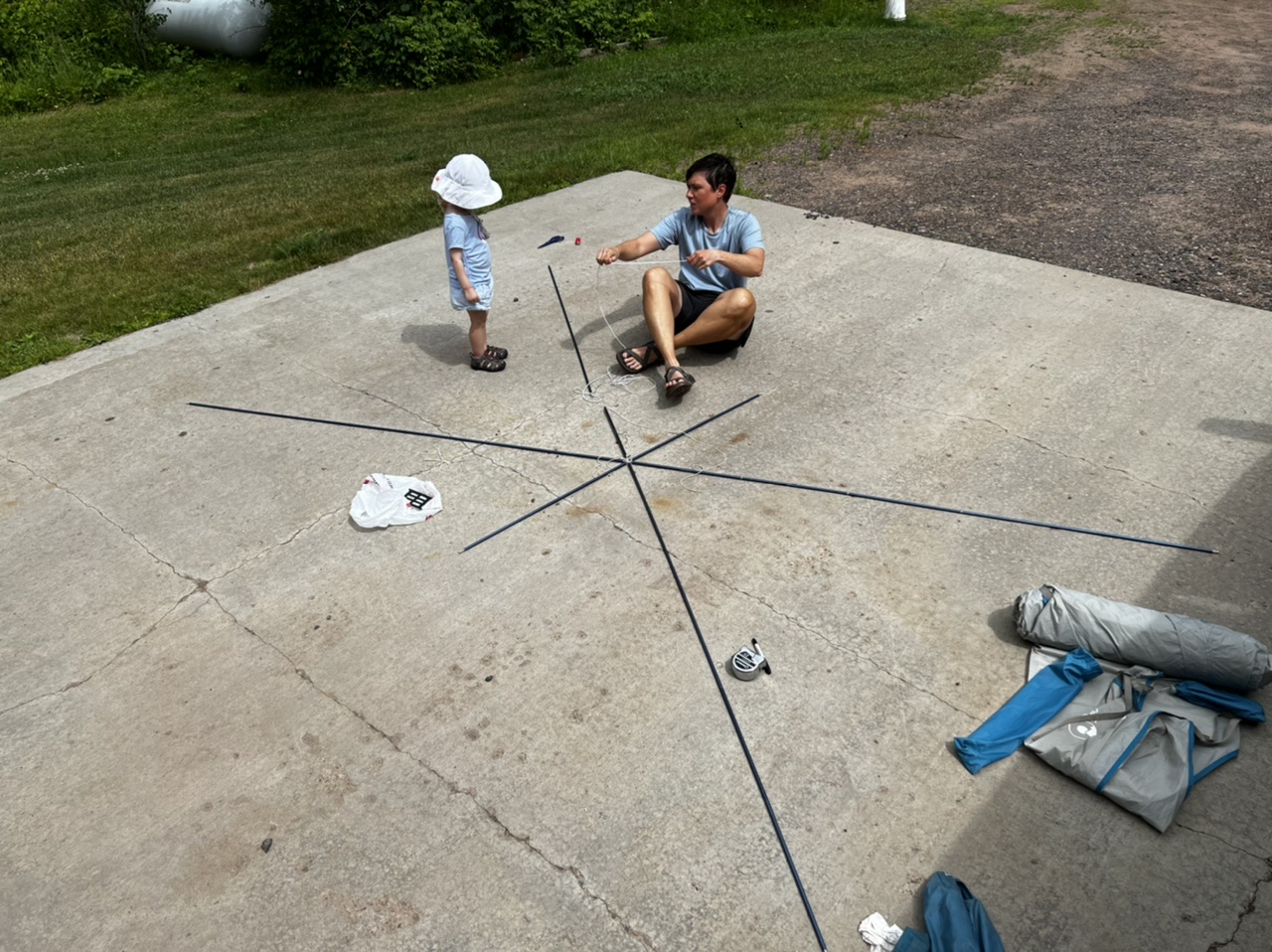 Izzy and I replacing the shock cord in my tent poles