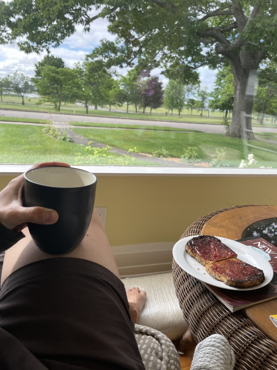 Enjoying coffee and toast while overlooking Lake Michigan