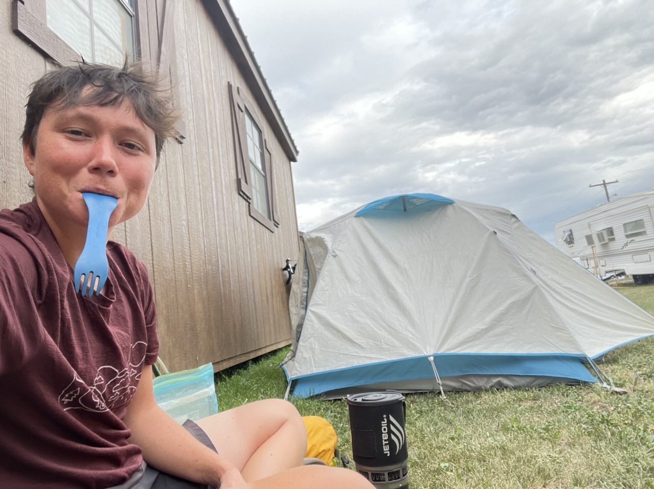 Cooking dinner by my tent by the cabin